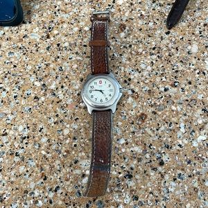 Men’s used Swiss army watch.   Needs battery